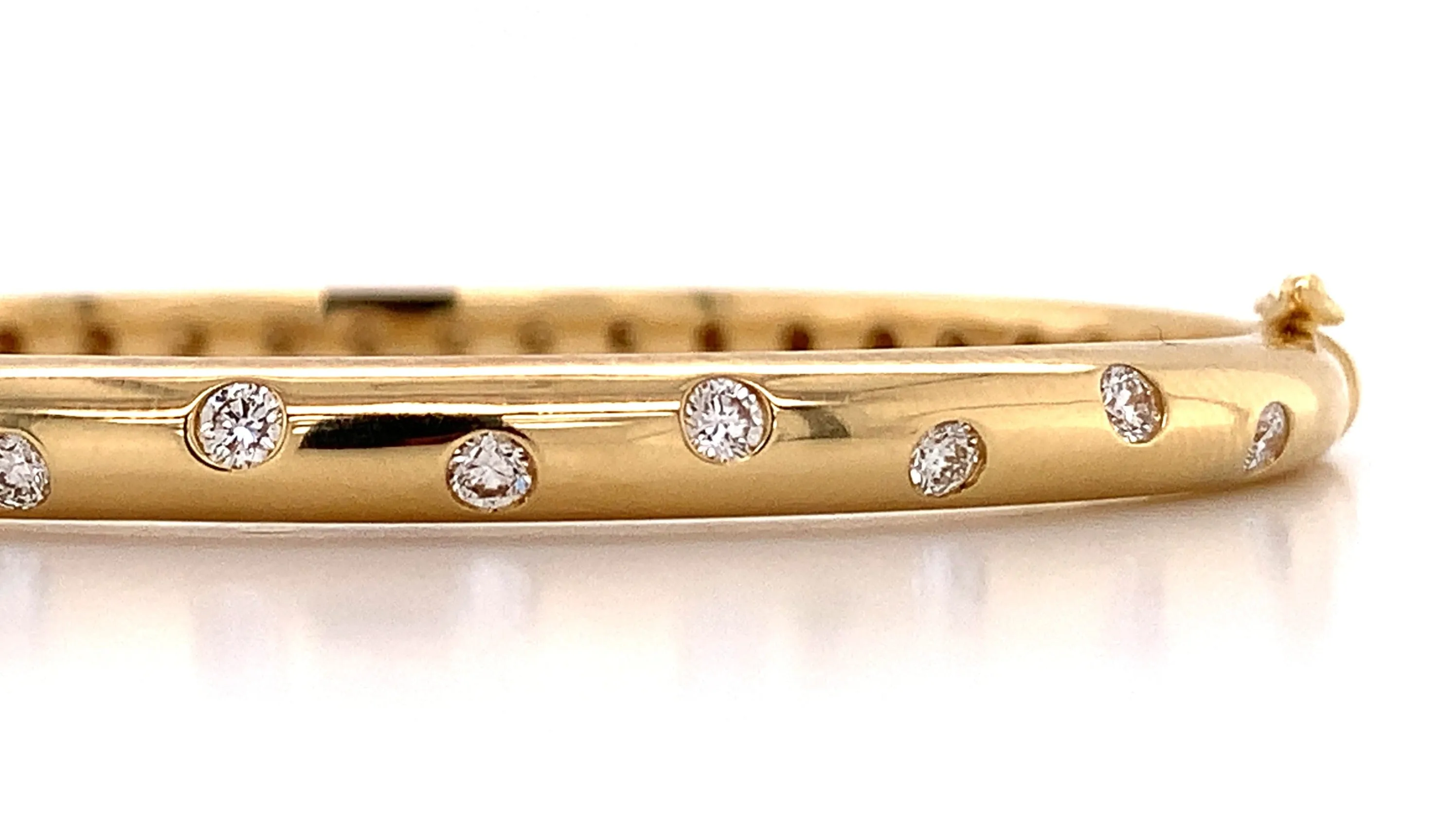0.54ct tw Burnish Set Diamond Station Bangle Bracelet