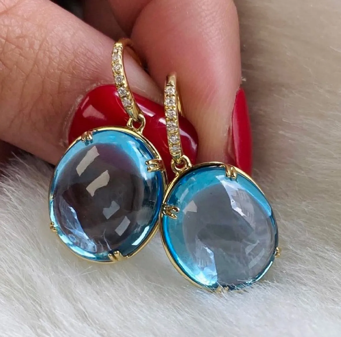 Blue Topaz Oval Earrings with Diamonds