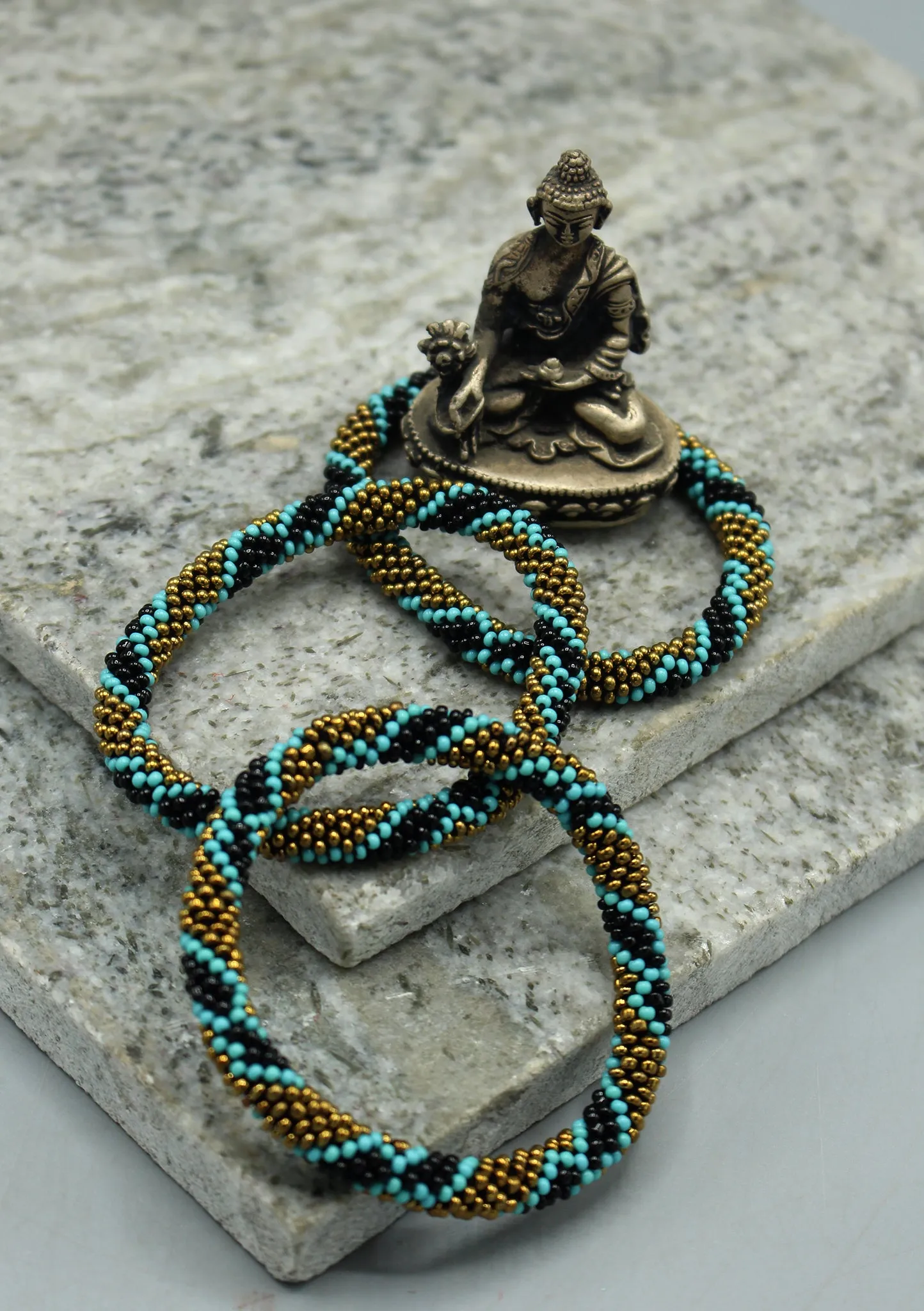 Gold, Black & Blue Beads Nepalese Roll on Bracelet