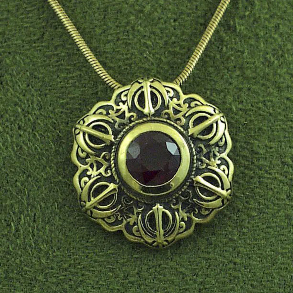 Ruby and gold khanda / adi shakti Talisman pendant